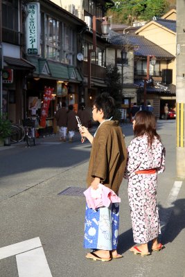 Young couple in yukata on the main street