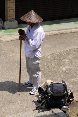 Shikoku pilgrim asking for alms