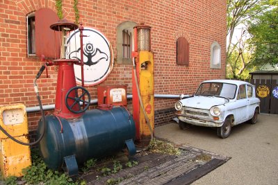 Old fuel pump and rusting car, Ōzu