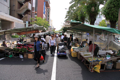 Shoppers perusing the market wares