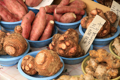 Various tubers and root vegetables at the market