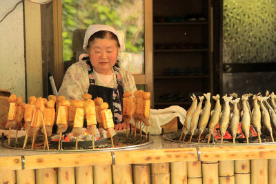 Woman selling dengaku (grilled skewers)