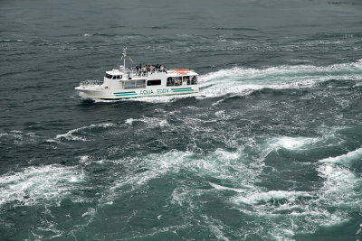 Aqua Eddy tourist boat passing the whirlpools