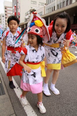 Mother with children in the parade