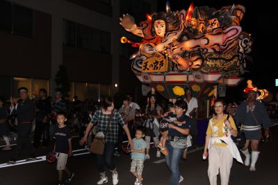 Groups of locals with festival float