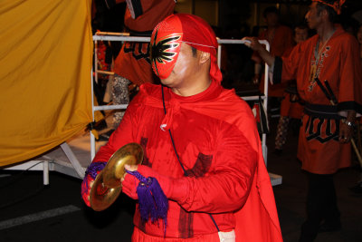 Masked cymbal player