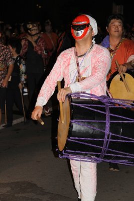 Masked taiko player