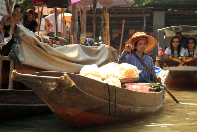 Woman and boat in the canal