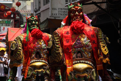 Costumed locals in a temple procession