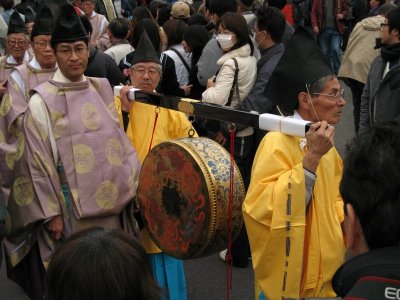 Carrying a ceremonial drum