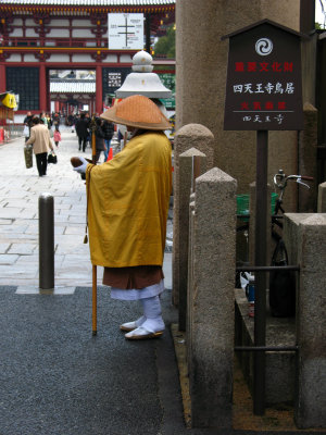 Monk below Shitennō-ji's Ishi-no-Torii