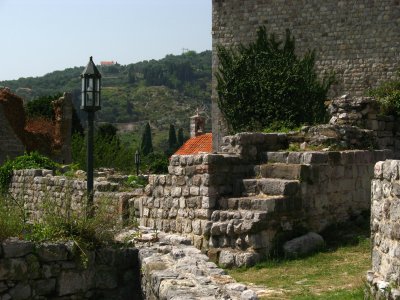 Building corner and distant church, Stari Bar