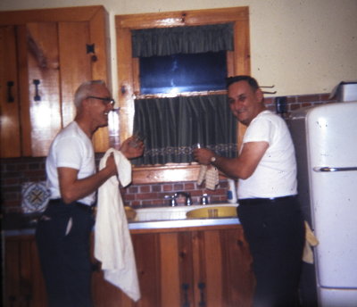 Grandpa and Uncle Johnny drying the dishes
