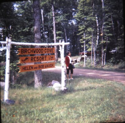 Grandma with Birchwood Cove sign