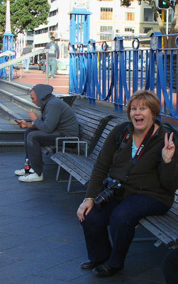 Photographer sitting down at Lower Queen Street.jpg