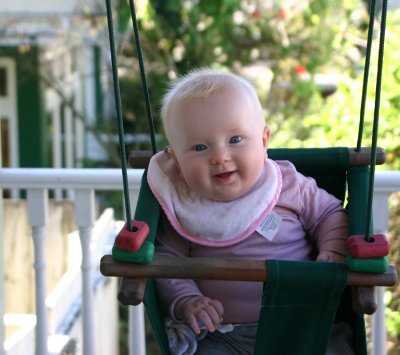 Mila in her swing.jpg