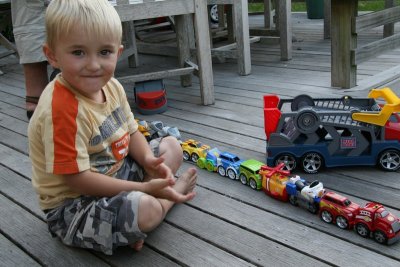 Zach and his cars.jpg