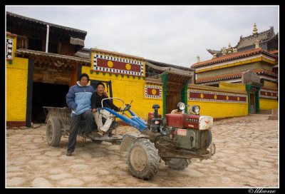 Tibetan people and tractor in Wutun Si