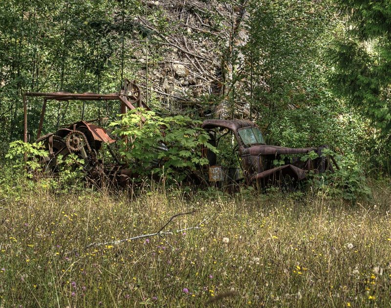 Old Farm Truck and Equipment Off Highway 20