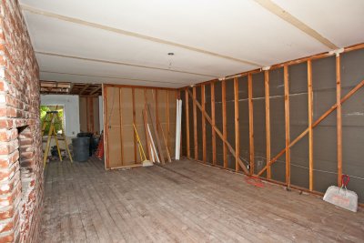 Monday 2:30pm -- Family room paneling and light fixture removed. 
