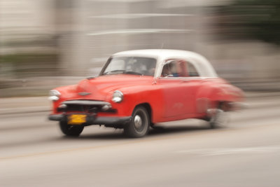 red car with white roof