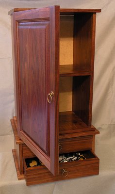 Cabinet with drawer and door open