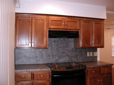 Cabinets with new stove and vent hood