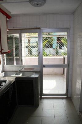 Before: Kitchen with patio beyond