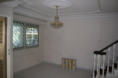 Before: Sitting Area to left of front door