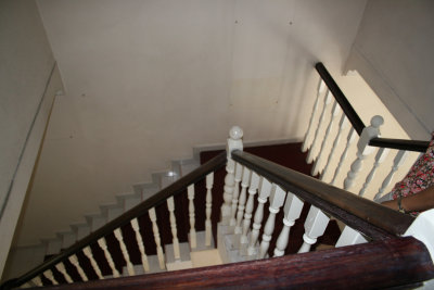 Before: Looking down stairs from top landing