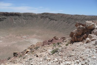 The crater is 700 ft deep & 4000 ft across