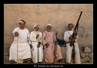 A man selling a rifle in Rustaq Suq