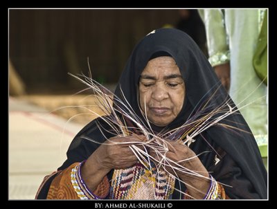 Omani Woman Working with Palm leaves