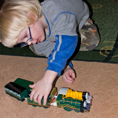 Charlie loves trains. He got some for his 5th birthday