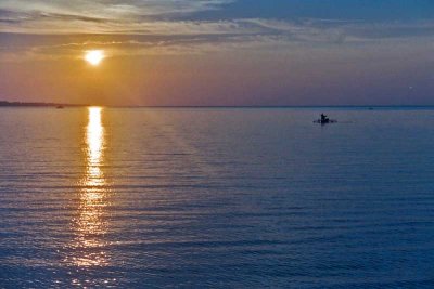 fishing boat tasik ria sunset