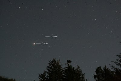 Jupiter and Uranus in a Moonlit Sky