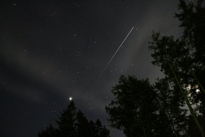 The ISS fading into the Earths shadow near Jupiter