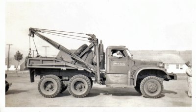 Sgt. Richard Glenn riding shotgun Heavy Armor Tow Vehicle, Ft. Benning, GA  1942