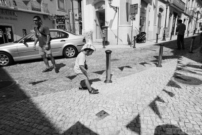 Boy playing in a small village in the Algarve, Portugal