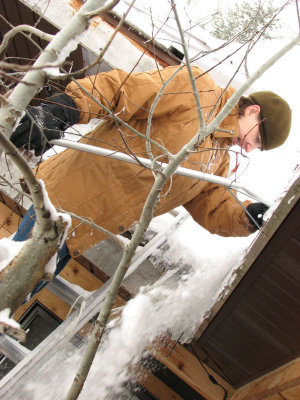 Deborah Clearing Snow from the Roof in Winter IMG_0807.jpg