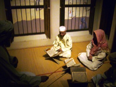 Depiction of boys learning Koran