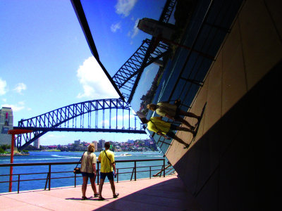 Bridge and people reflected in  Opera house.jpg