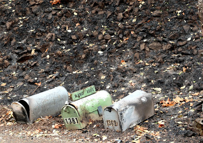 mailboxes on charred ground