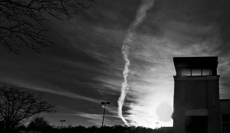 Contrail at sunset B&W - color version below