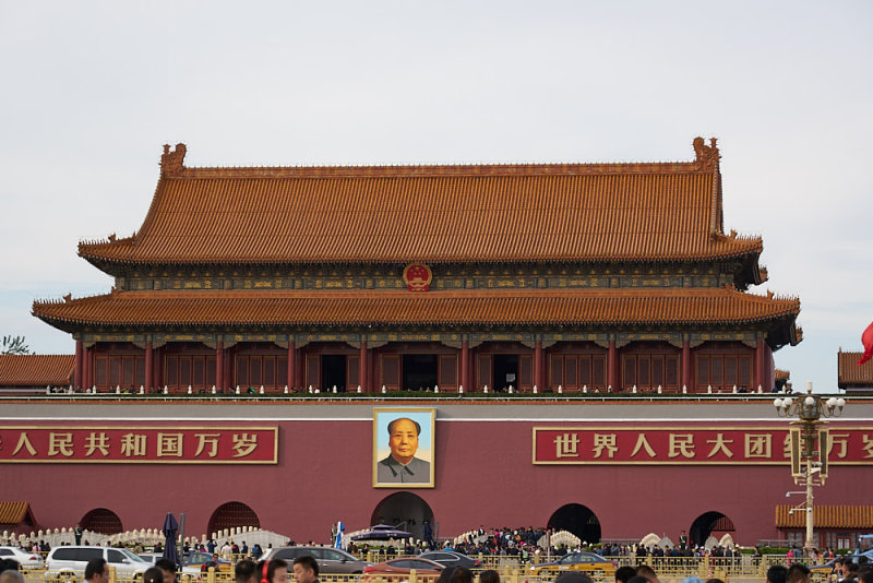 Tiananmen square. Gate of Heavenly Peace with the face of mass-murderer Mao grinning from it.
