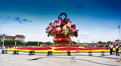 Tiananmen square. Chinese unity flowers: unity or else.