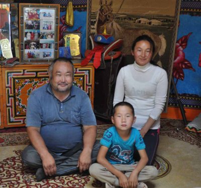 Experienced herdsman with daughter and grandson