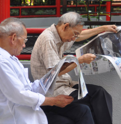 Reading the papers in Hong Kong