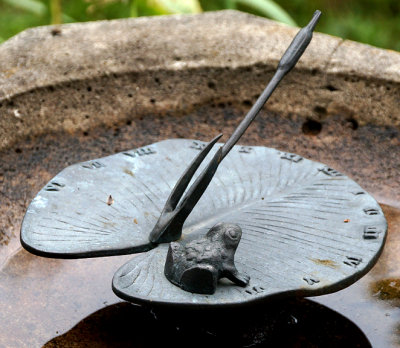 Sundial - bronze lilypad.