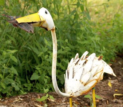 Crane with fish sculpture.